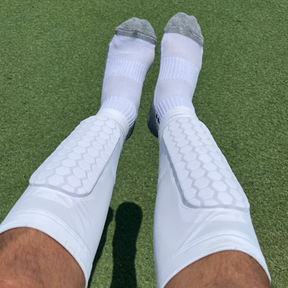 Canilleras integradas tipo calcetín MegaShin™